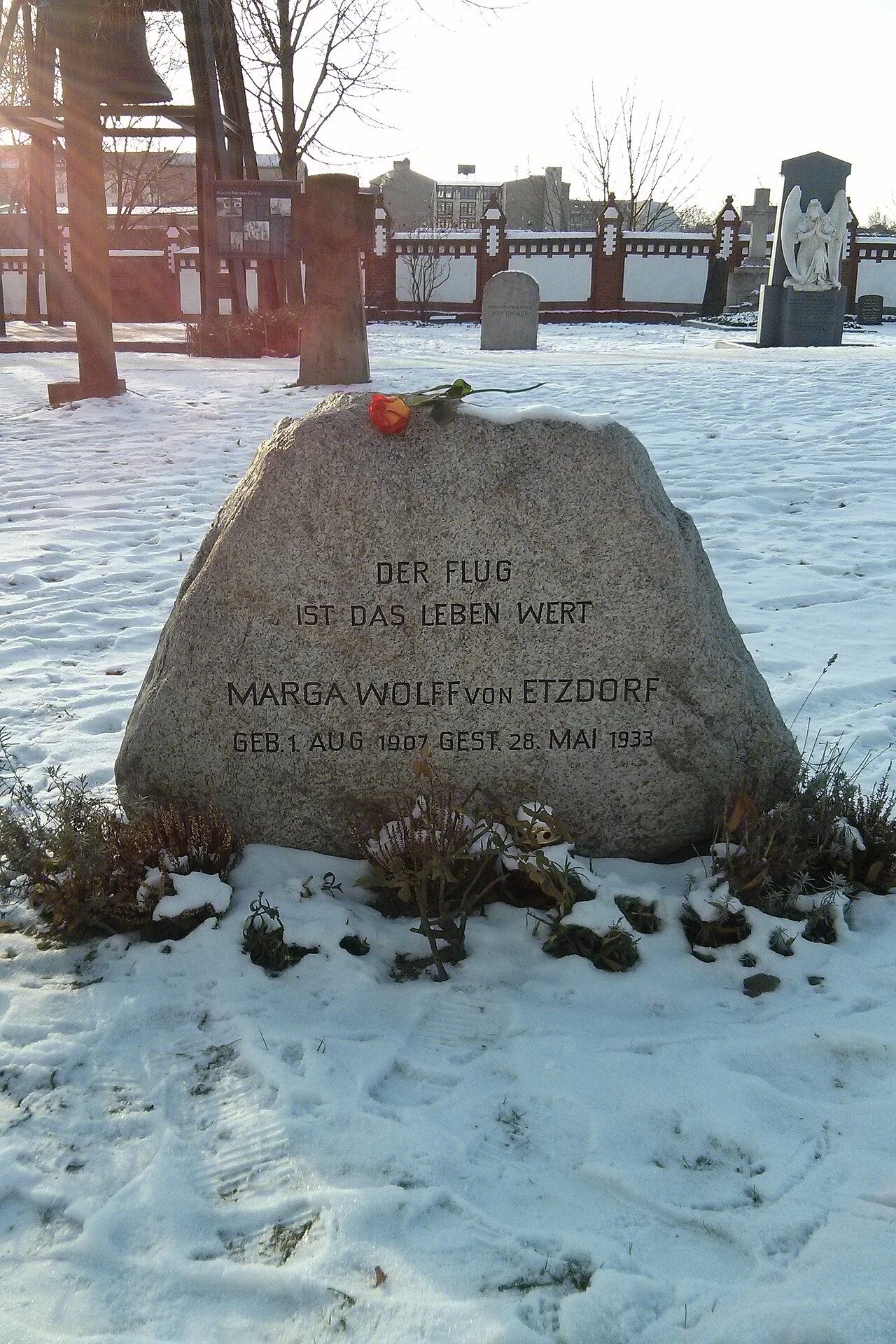 Boulder monument on aviator Marga von Etzdorf’s snow-covered grave