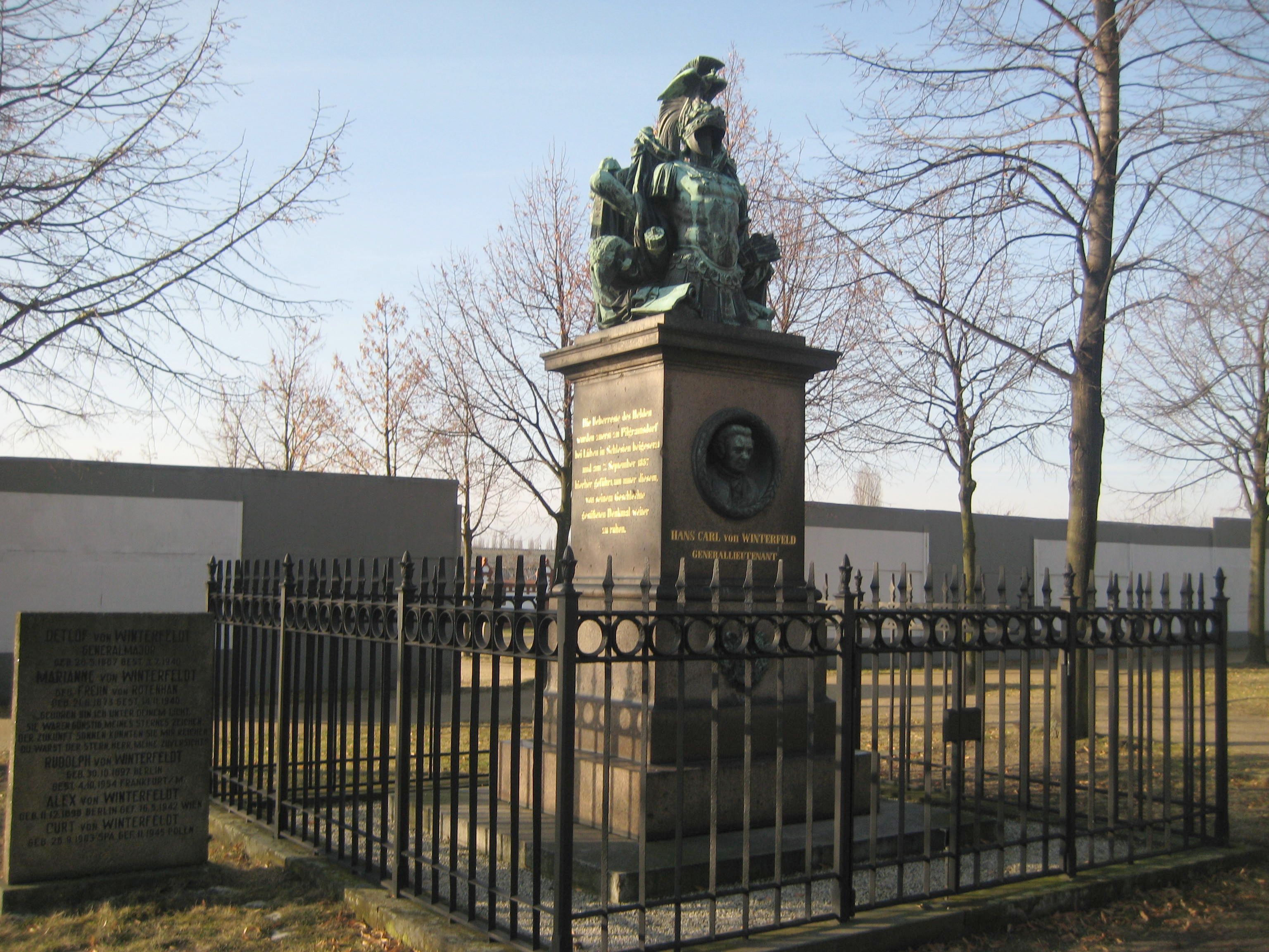 Hans Karl von Winterfeldt’s monument with a portrait medallion, military ornament and iron enclosure