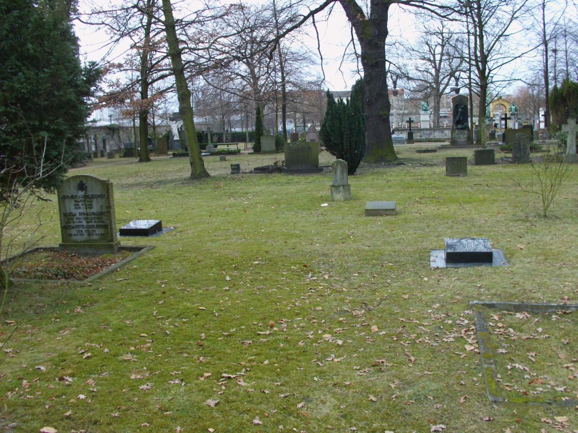 Gravestones and mature trees in the western part of the Invalids’ Cemetery